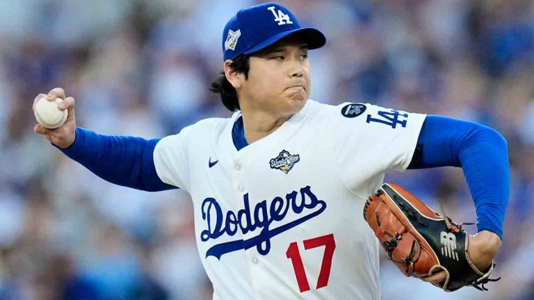 Los Angeles Dodgers pitcher Shohei Ohtani throws against the Toronto Blue Jays during the first inning in Game 4 of baseball's World Series, Tuesday, Oct. 28, 2025, in Los Angeles. (Brynn Anderson/AP)