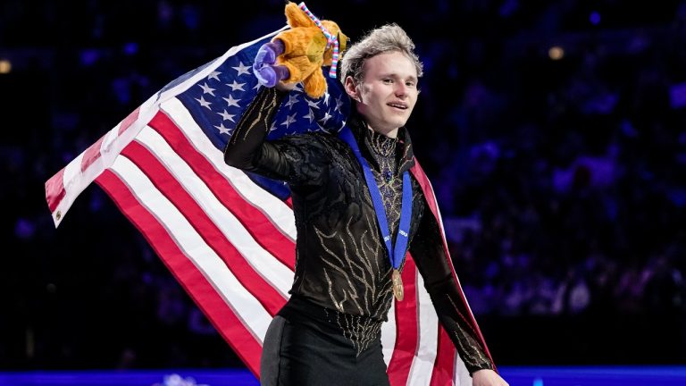 Gold medalist Ilia Malinin from the United States waves to spectators after the medal ceremony after the men free skating at the Figure Skating World Championships in Prague, Czech Republic, Saturday, March 28, 2026. (Petr David Josek/AP)