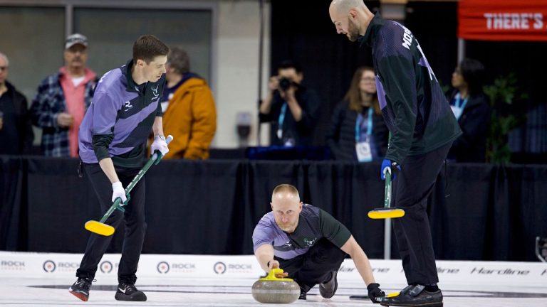 Team Shield skip Brad Jacobs delivers a stone with teammates Amos Mosaner and Dan Marsh ready to sweep during a Rock League game against Team Alpine at Toronto's Mattamy Athletic Centre, on Monday, April 6, 2026. (CP/Handout — The Curling Group, Anil Mungal)